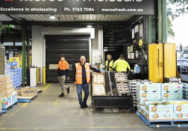 A man packing in a Morco truck.